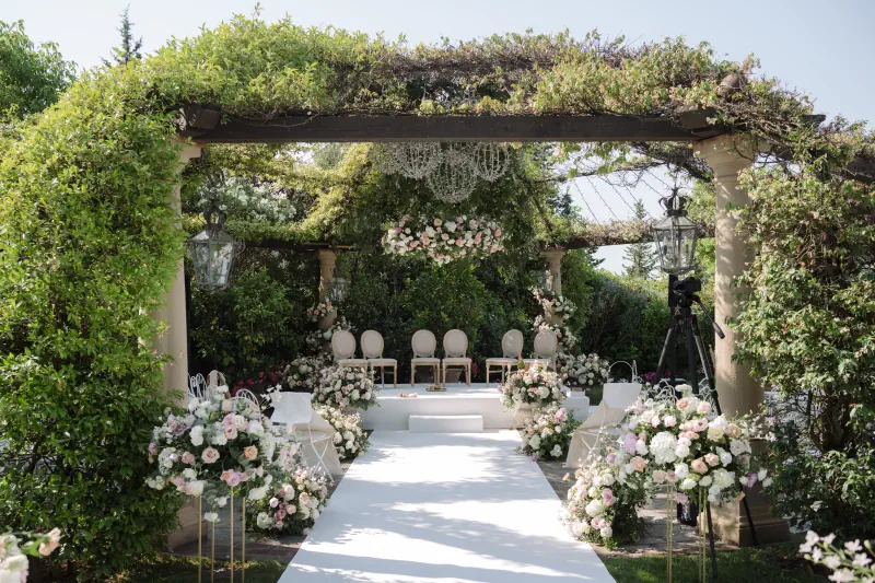 Elegant outdoor wedding ceremony setup in Tuscany